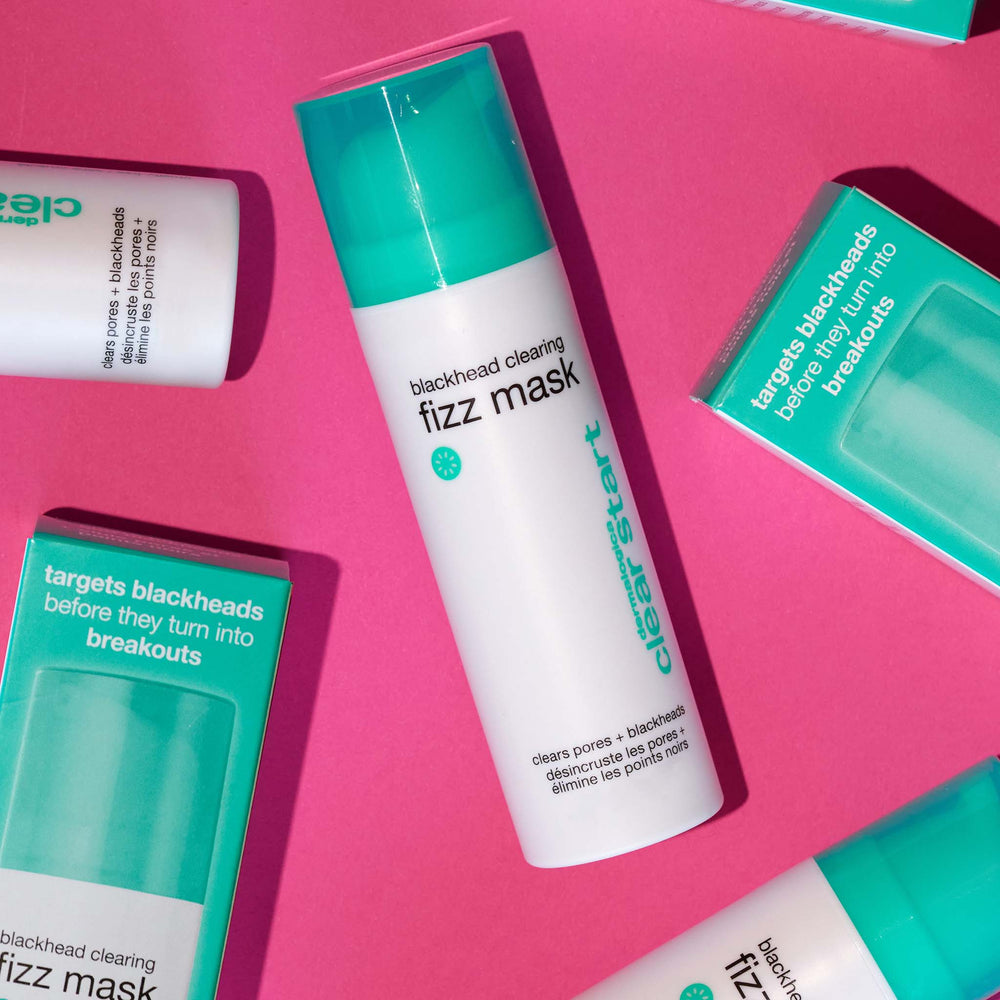 Blackhead clearing fizz mask with green and white packaging on a pink background