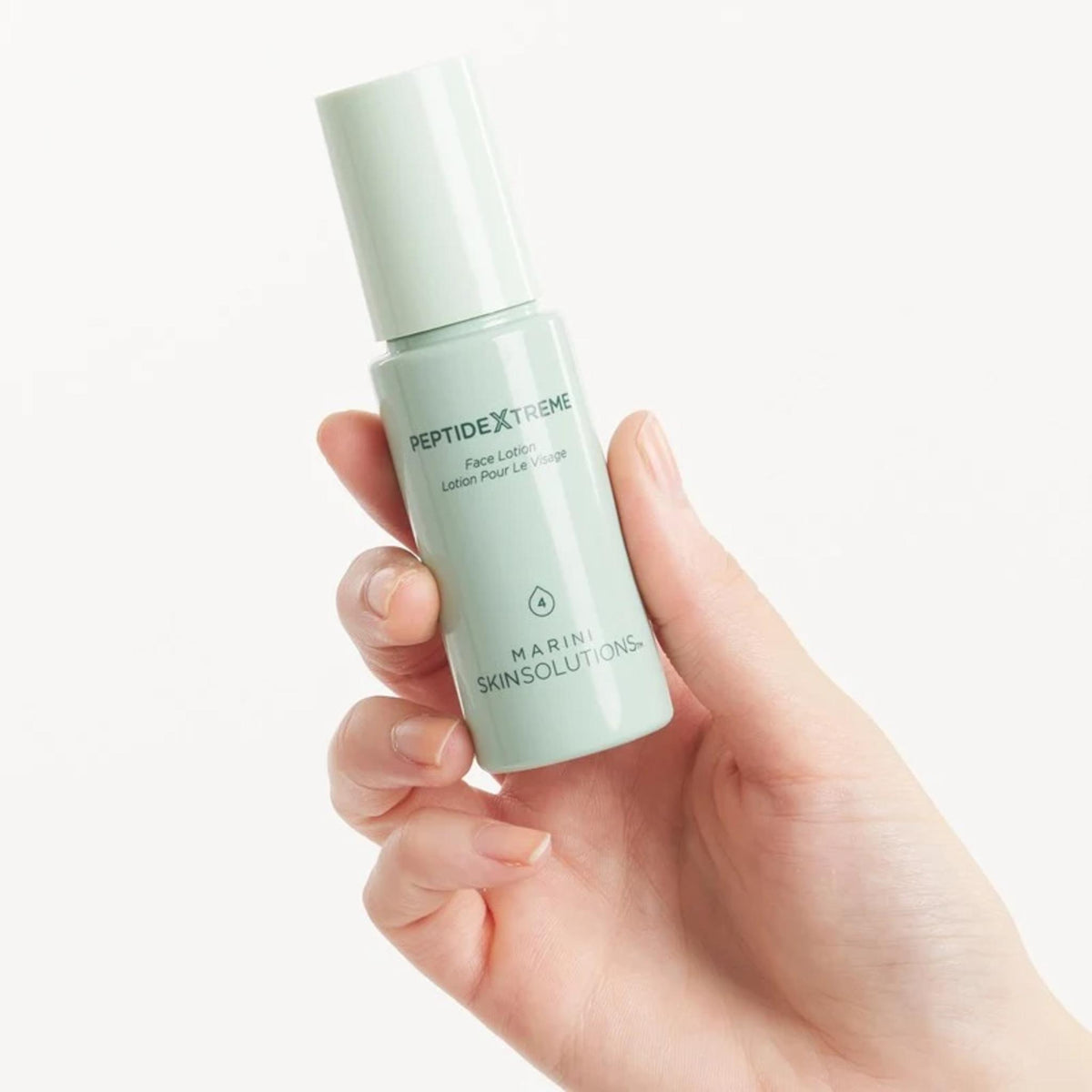Marini SkinSolutions Peptide Xtreme Face Lotion held in hand
