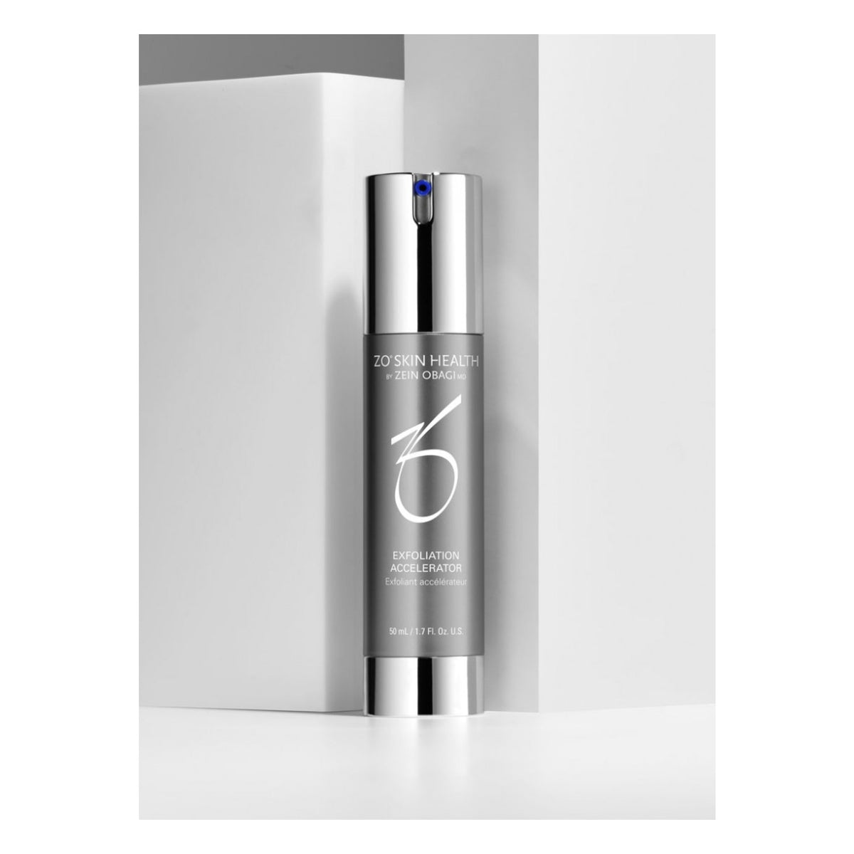 ZO Skin Health Exfoliation Accelerator 50mL stands upright against a minimalist white and light gray geometric background.
