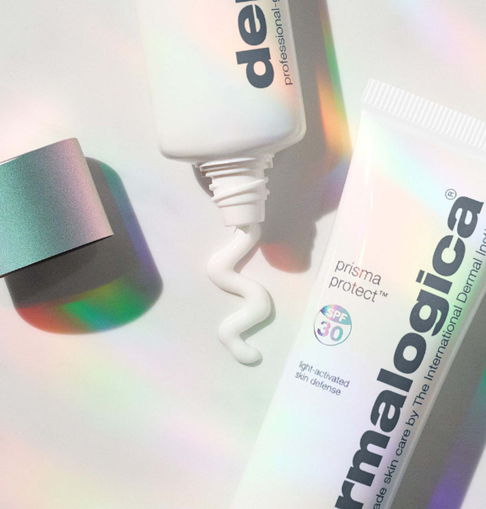 Dermalogica prisma protect products with a colorful gradient background